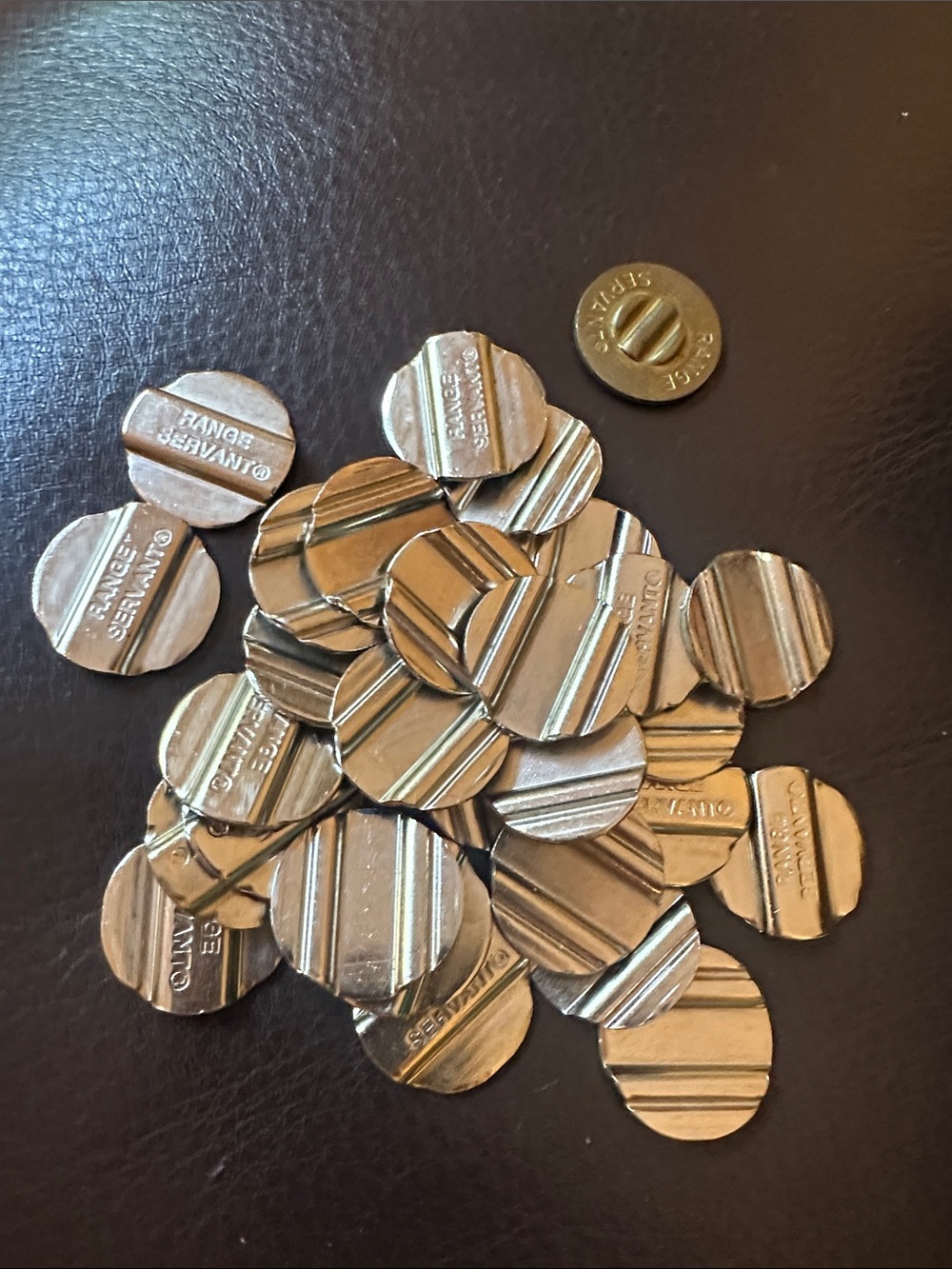 29 Seattle golf range tokens. Range Servant.